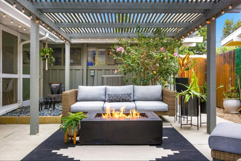 Pergola vs gazebo comparison in a modern backyard outdoor living space