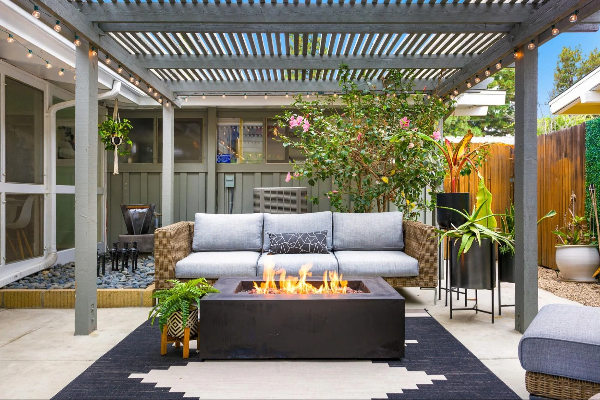 Pergola vs gazebo comparison in a modern backyard outdoor living space